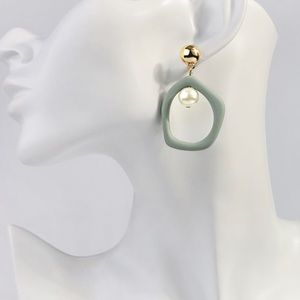 Unique round green pearl earrings